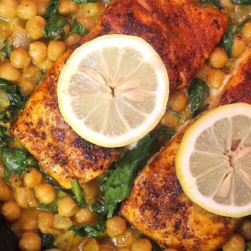 coconut curry chickpeas with salmon and lemon