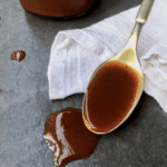 front view of coca-cola bbq sauce on spoon with napkin