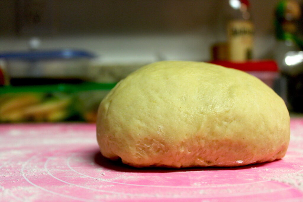 ball of cinnamon roll dough after kneading