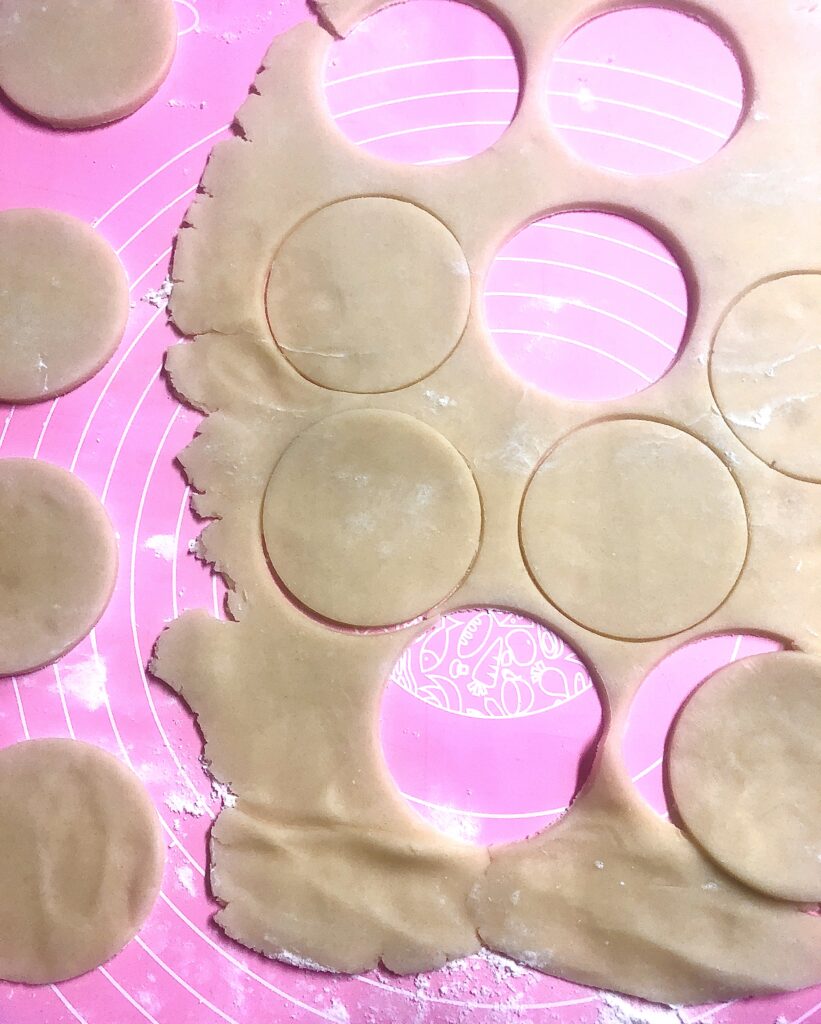 Round pieces of pie dough cut out