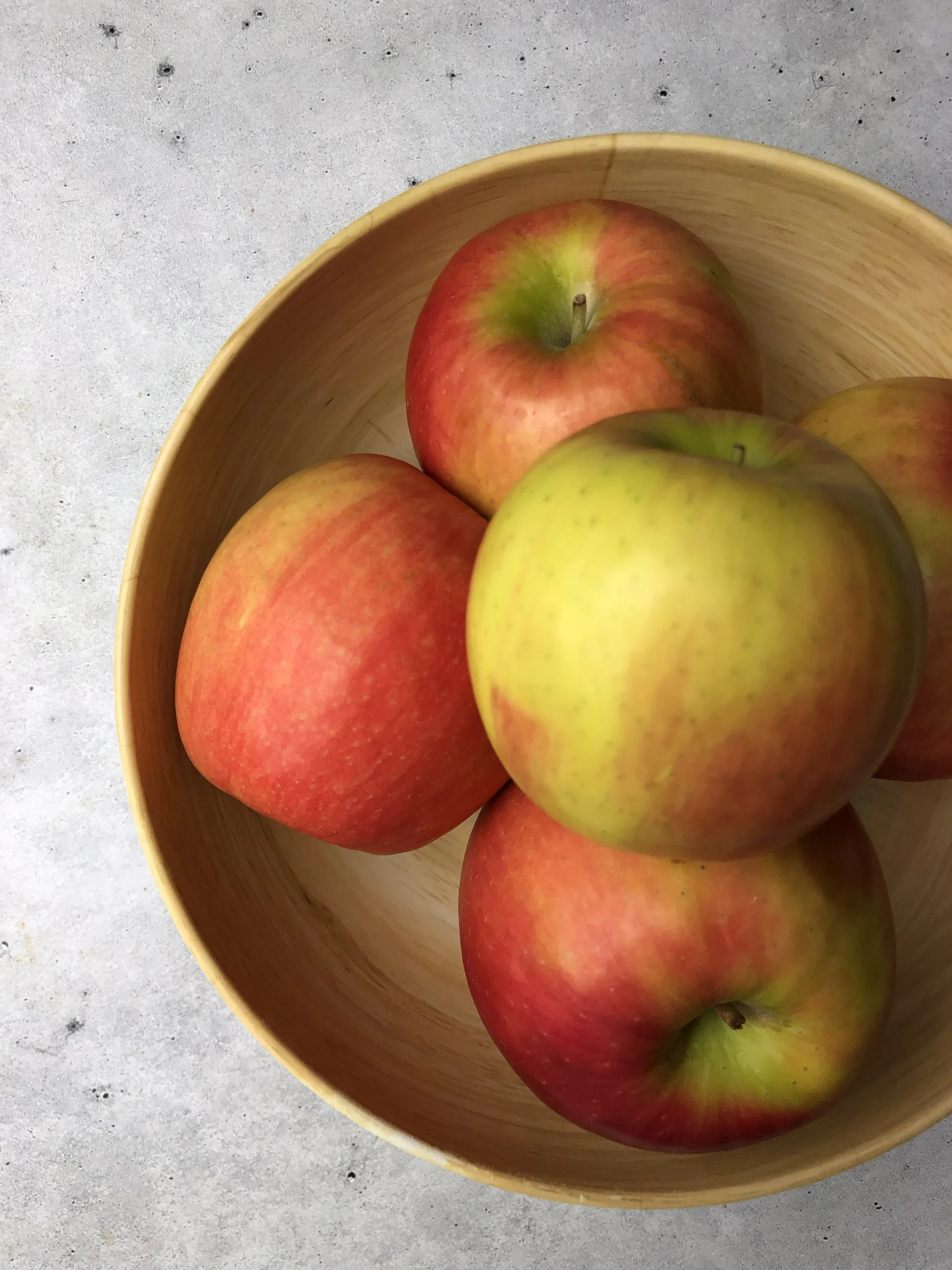 pink lady apples in a bowl