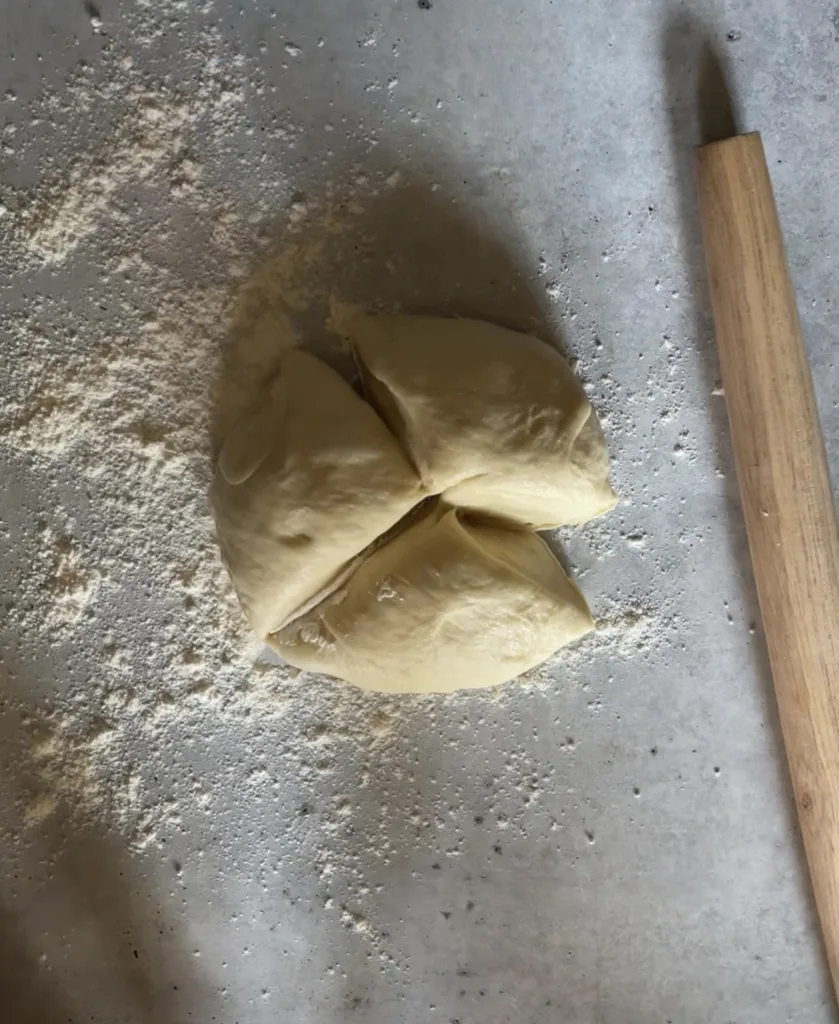 milk bread dough split into three parts