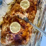 Salmon on baking sheet