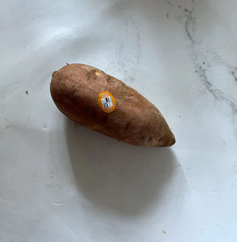 sweet potato on white countertop