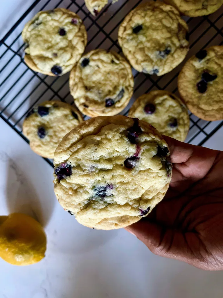 blueberry lemon cookies on cooling rack after baking