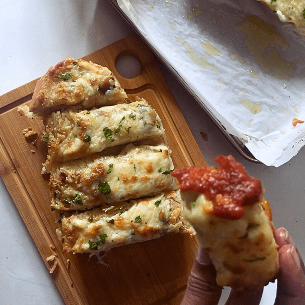 cheesy garlic bread dipped in marinara